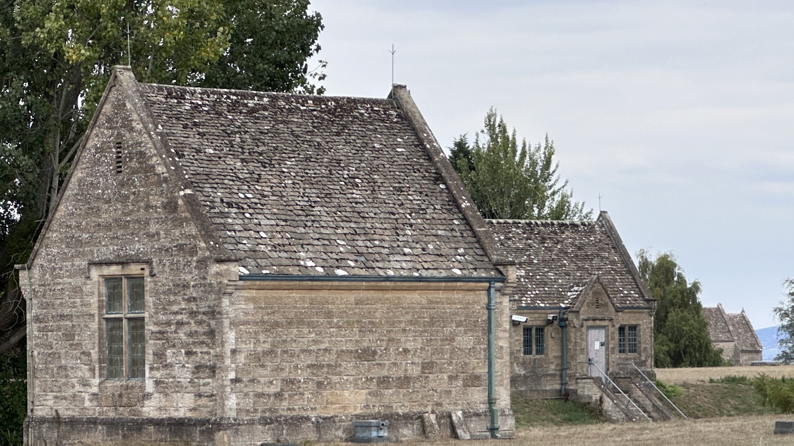 View across Original 1940 Reservoir buildings with St Bartholomew's Church in background